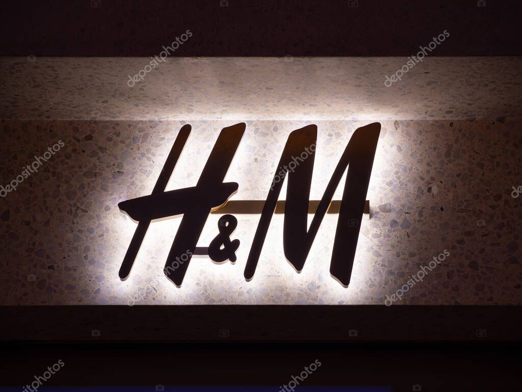 Innsbruck, Austria - March 20, 2025: HM store sign. H and M Hennes and Mauritz AB, also known as HM Group, is a multinational clothing company