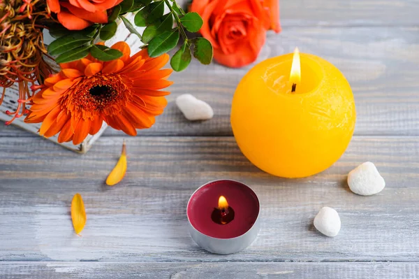 Flat Lay Still Life Orange Flowers Lit Candles Pebbles Rustic — Stock Photo, Image
