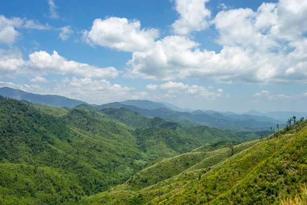 stock image Beautiful scenic of mountain in layer with green forest covered at Mokochu Noi in Mae Wong National Park in Thailand.