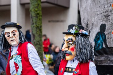 Basel, Basel-Stadt Canton, İsviçre - 12 Mart 2025: İsviçre 'deki Karnaval katılımcıları. Basel Fasnacht 2025 Geçit Maskesi.