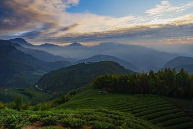 Enjoy the beautiful dynamic clouds surrounding the mountains