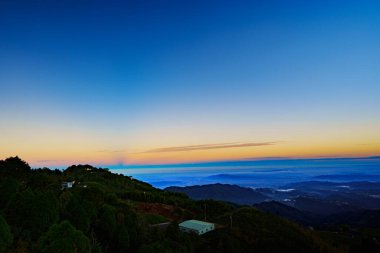 The bright and warm sunlight rise from the back of mountains