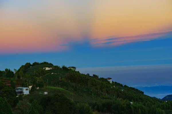 The awesome and warm light from the sunrise behind the mountains