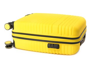 Yellow plastic suitcase isolated on white background.