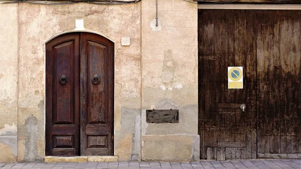 front access doors to rustic building as background
