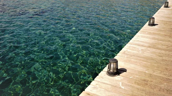 stock image wooden pier on the sea side as a background