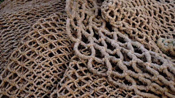 chaotic texture of stacked fishing net as background