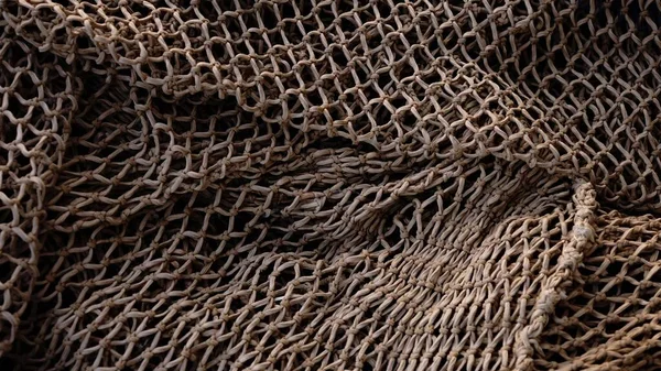 stacked fishing net texture as background