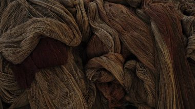 Arka plan olarak istiflenmiş balık ağlarının tekstil şekilleri