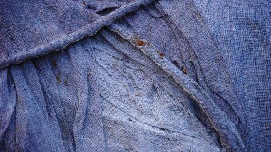 Aşınmış ve eski kumaşın soyut arkaplanı