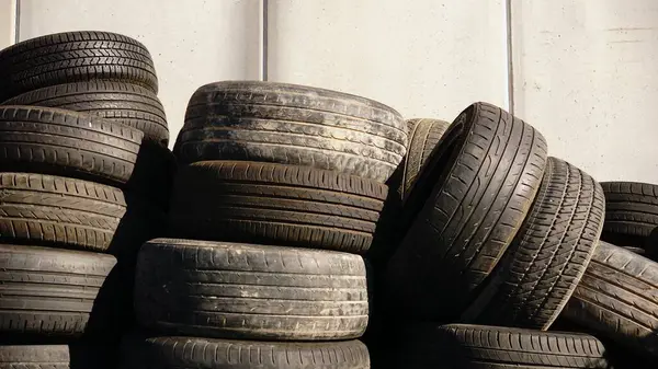 old tires for recycling stacked