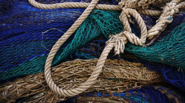 Yığılmış endüstriyel kırsal balıkçılık ağlarının arka planı