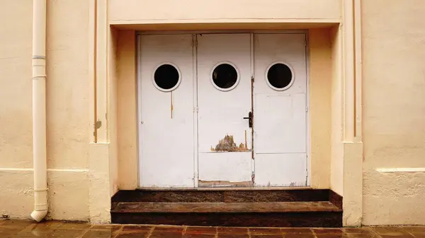 worn security doors on the street front