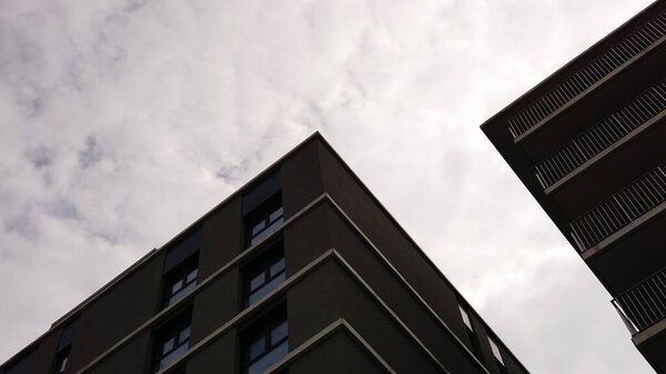 Contemporary residential facades against sky