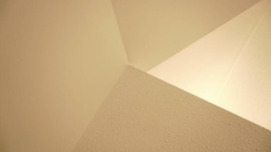 Beyaz geometrik yüzeylerin soyut arkaplanı