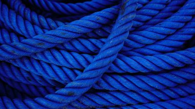 coiled blue rope as a background clipart