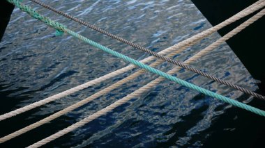 mooring cables crossed in the port