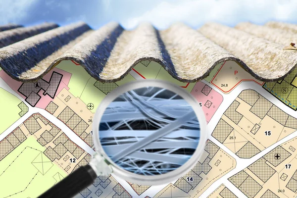 Dangerous asbestos roof with airborne fibers seen through a magnifying glass and microscope - concept with an imaginary city map