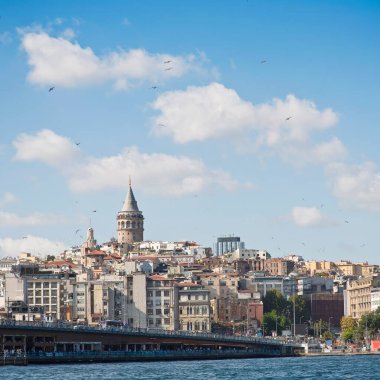 View of the famous fourteenth-century Galata Tower and Galata Bridge from the Bosphorus Strait - Istanbul - Turkey