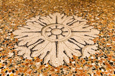 Detail of an ancient Italian mosaic and grit flooring called Venetian floor