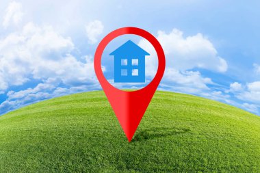 Real Estate and Building Activity concept with a vacant land on a green field available for building construction - concept with red location pin point icon