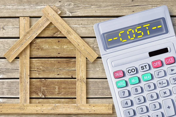 Costs about wooden buildings construction - build your comfortable home with natural materials and sustainable resource - responsible business concept with calculator