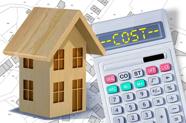 Costs about wooden buildings construction - build your comfortable home with natural materials and sustainable resource - responsible business concept with calculator and wooden home model