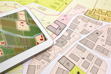 Bina, dijital tablet üzerindeki hayali kadastro ile birlikte genel şehir planıyla birlikte inşaat faaliyetleri ve inşaat endüstrisi kavramına izin verdi