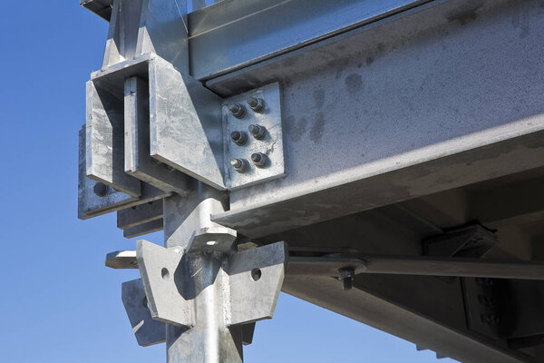 Detail of a new prefabricated structure, steel carpentry with pillars, steel beams and galvanized steel bolts