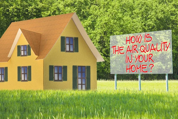 HOW IS THE AIR QUALITY IN YOUR HOME? - Concept with home model against a rural scene and information sign