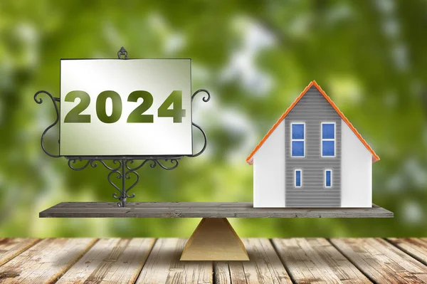 2024 Planning and manage home -  Budget 2024, tax, loan, real estate, property investment - Business and financial concept in building activity and construction industry with home model