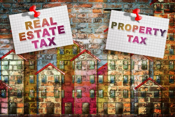 Property and Real Estate taxes concept with imaginary cityscape and information placard