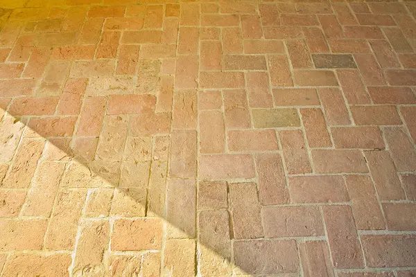 Typical old tuscany terracotta floors called a herringbone pattern due to its particular shape - Italy
