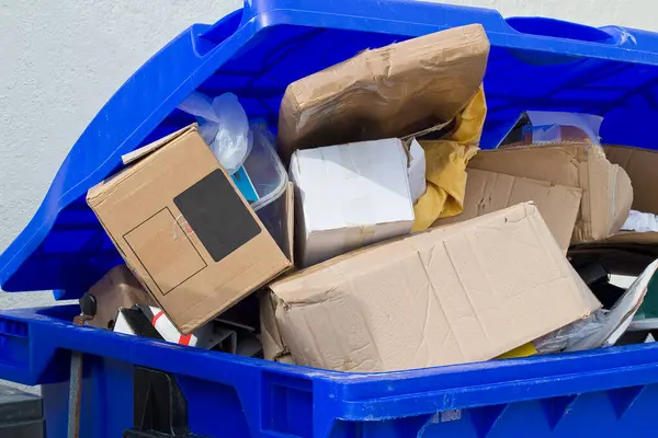 stock image Cardboard boxes collected in a dumpster ready to be recycled - Recovery and recycling material