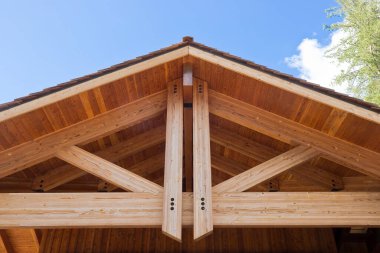 New wooden truss structure called palladian truss with beams and wooden roof 