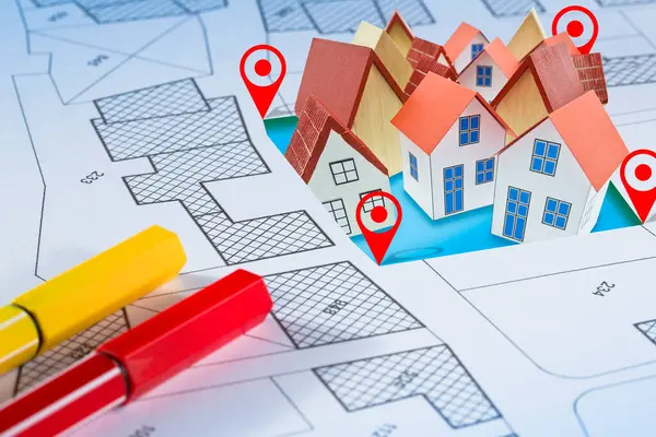 stock image Land plot management - Real estate concept with a vacant land and cadastral parcel available for building activity and construction industry with residential home model