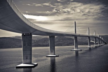 Peljeasc Bridge - Europe, Croatia - Peljeski most connects Croatia to Dubrovnik, the old roman Ragusa city - Bridge with reinforced concrete pylons, steel structure and cable-stayed structure clipart