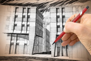 Mimar, tasarımcı ya da mühendis zarif, yeni modern bir kasabada yeni bir binanın taslağını tasarlıyor - kamu konut imajı.