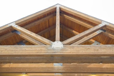 New wooden truss structure called palladian truss with beams and wooden roof 
