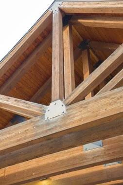 New wooden truss structure called palladian truss with beams and wooden roof 