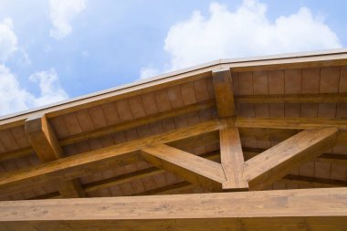 New wooden truss structure called palladian truss with beams and wooden roof 