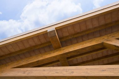New wooden truss structure called palladian truss with beams and wooden roof 