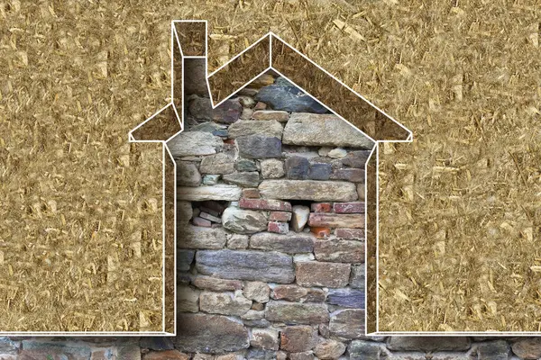 GENGİ EFENİTİKENLİĞİNİ BÜYÜKLENMEK İSTİYOR VE taş bir duvara karşı termal kayıpları azaltmak - ev simgesi ile enerji verimliliği ve tasarruf kavramı oluşturmak