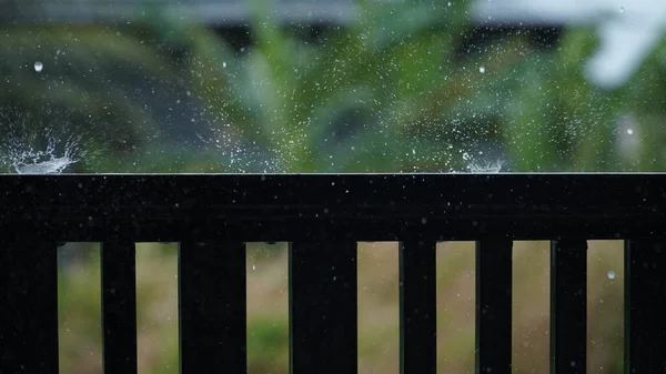 rain splash on the iron fence