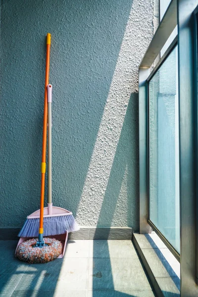 Cleaning tools outside the house - Scoop for dust, broom and mop