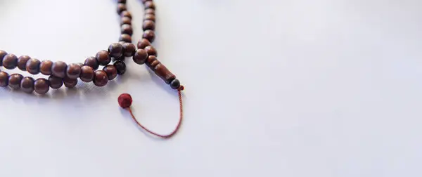 tasbih. Prayer beads. with copy space. Islamic background.