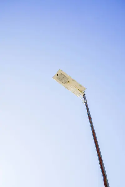 Public street lighting pole with LED lights with clear blue sky