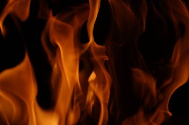 Yangın arka planı. Isı enerji yığını, kırmızı ve sarı, gece boyunca yakıt noktasındaki termal enerji siyah arka planda.