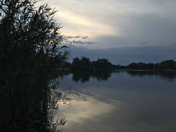 stock image Sunset over the lake in summer