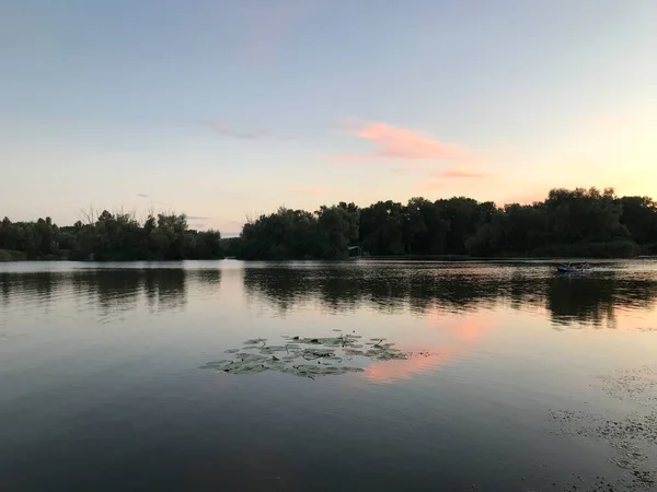 stock image Sunset over the lake in summer